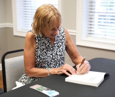 Joy signing book