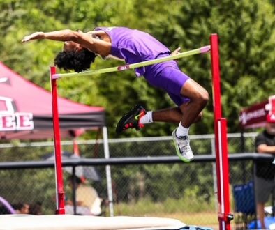 highschooler clearing the bar