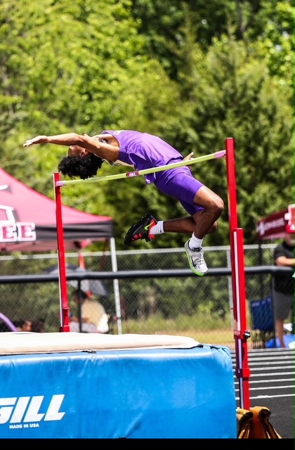 highschooler clearing the bar