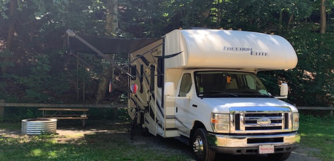 Rigdon at PJ Hoffmaster State Park motorhome parked at campground
