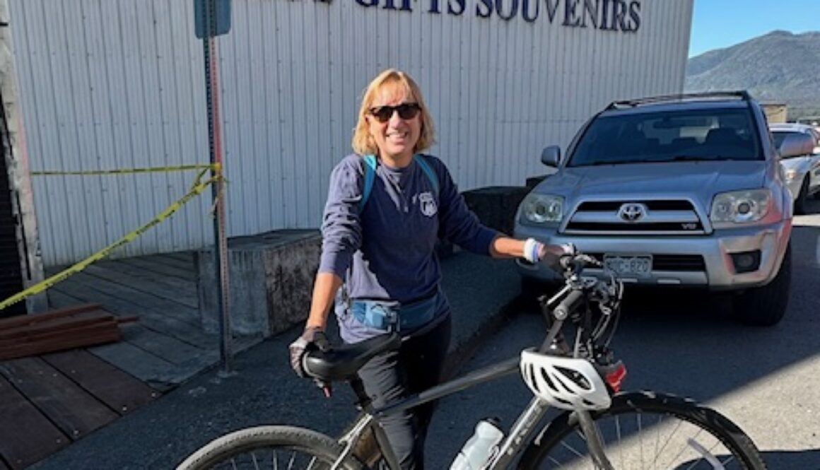 Joy with bike in Alaska