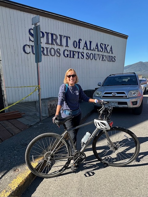Joy with bike in Alaska
