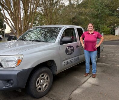 Michaela by her work truck Bug Woman