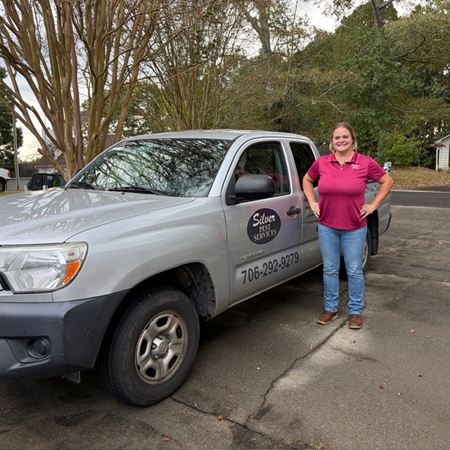 Michaela by her work truck Bug Woman
